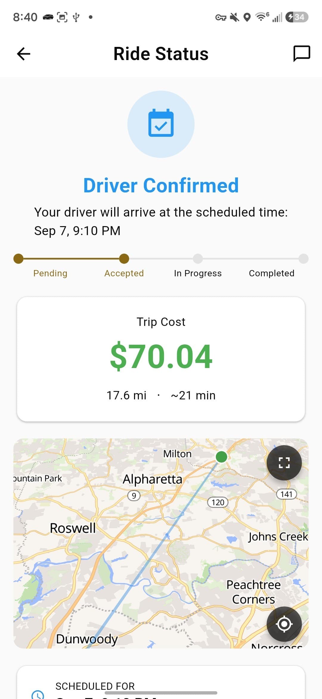 Ride status after a driver is confirmed, showing the trip cost and route.